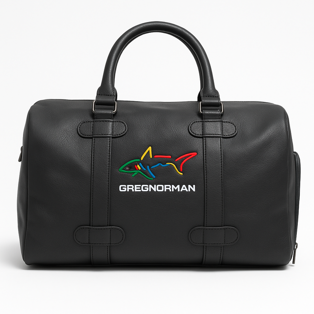Black duffel bag with colorful shark logo and 'Greg Norman' text on a white background