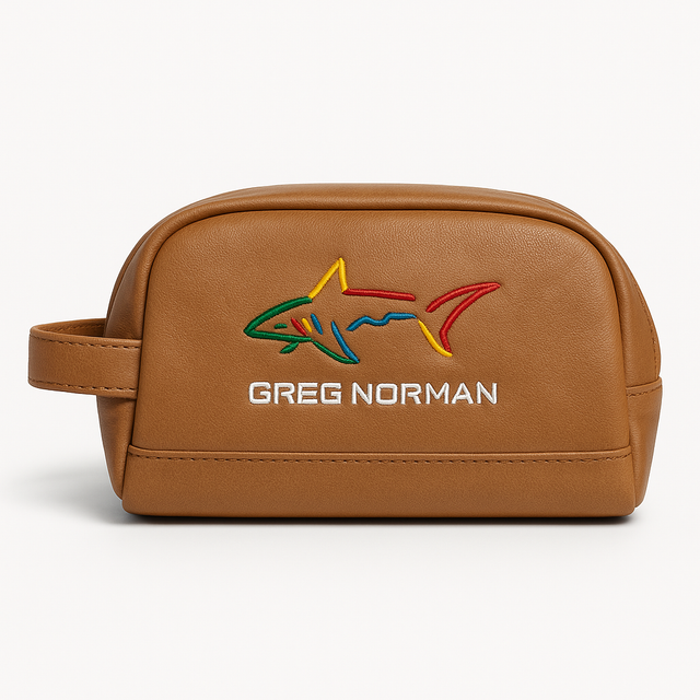 Brown leather pouch with Greg Norman logo on a white background
