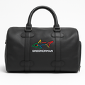 Black duffel bag with colorful shark logo and 'Greg Norman' text on a white background
