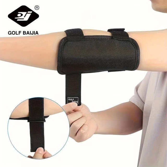 A black golf bajia arm support brace shown being worn on a person's upper arm, with a hand adjusting the strap and a circular inset showing the strap detail. The brand logo 'GOLF BAJIA' is visible in the top left.